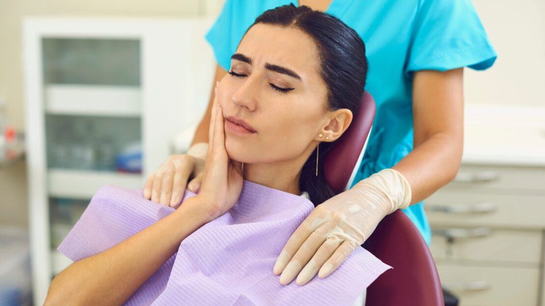 Patient experiencing jaw pain from teeth grinding receives compassionate care from dentist in Snellville.