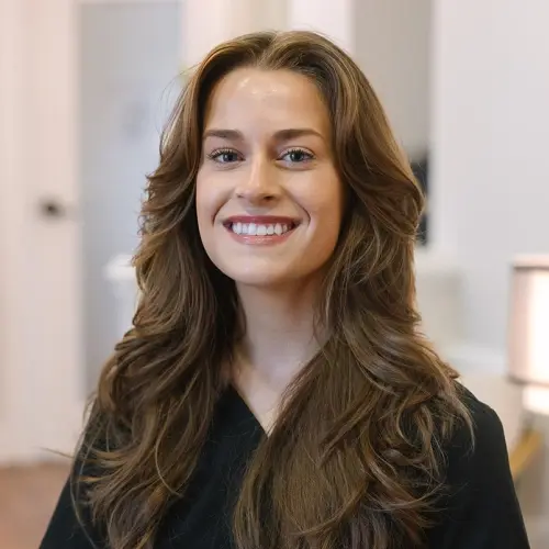 Laurel, dental assistant at Snellville dental practice, smiling at camera.