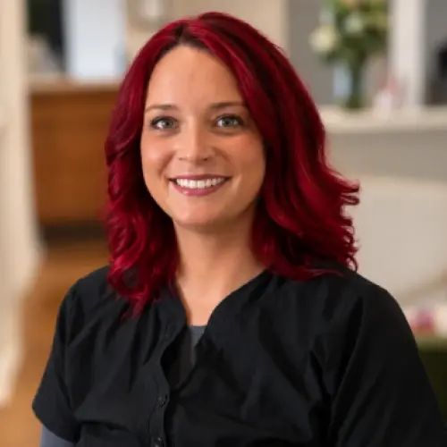 Mattie, dental assistant at Snellville dental practice, smiling for professional portrait.