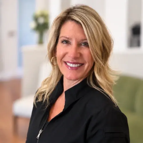 Shannon, dental hygienist at Snellville, GA dental practice, smiling professionally.