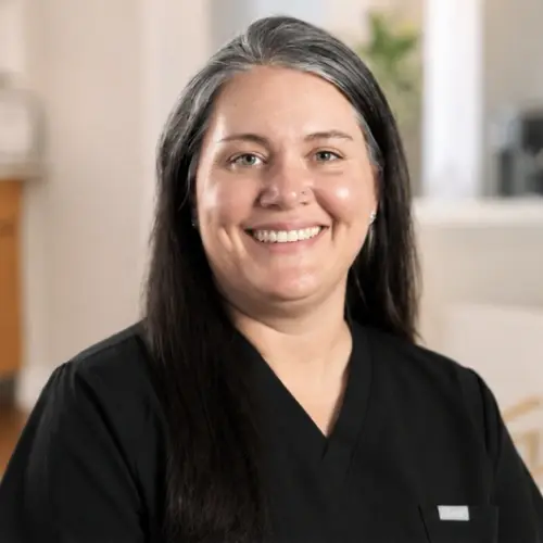 Tara, Practice Manager of Operations at dental practice in Snellville, GA, smiling for professional portrait.